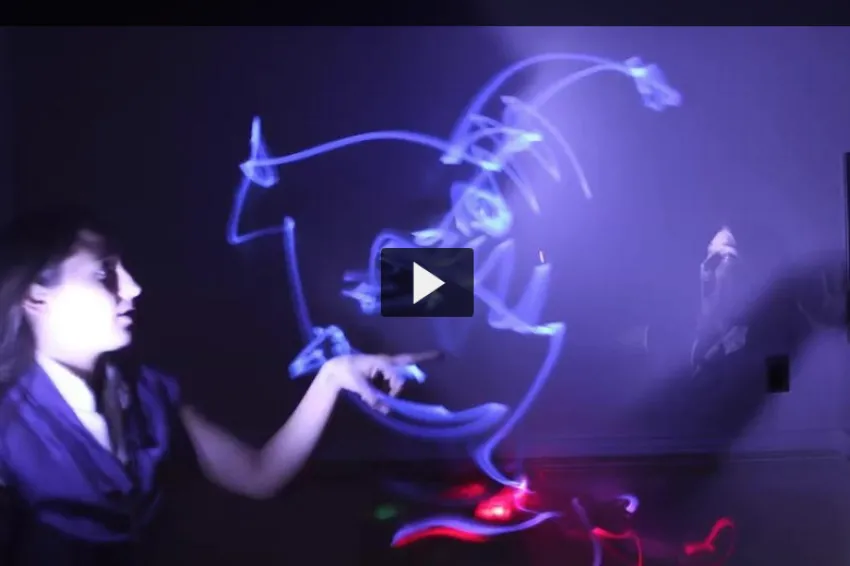 Screenshot from video of someone demonstrating light painting. 